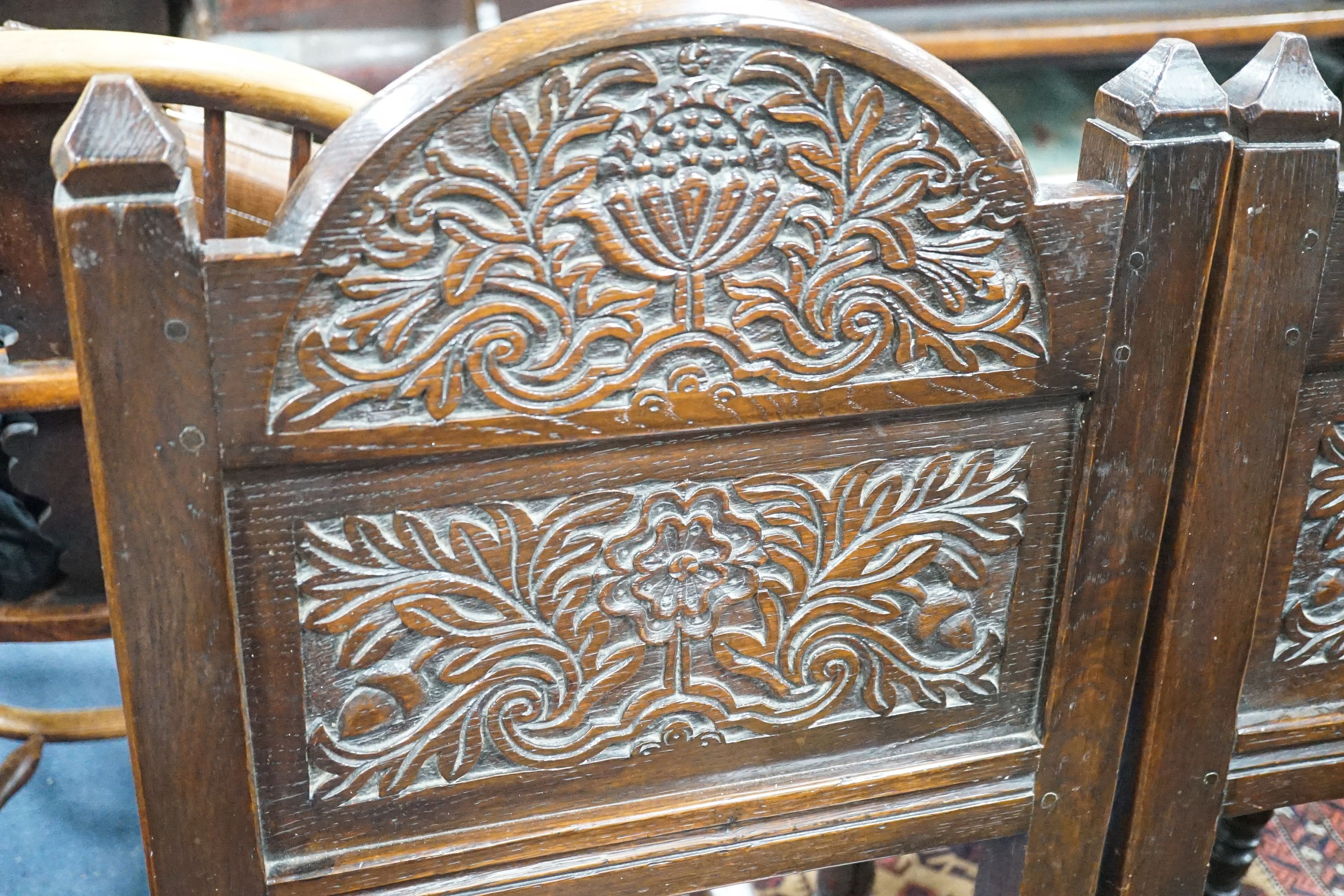 A pair of 17th century Lancashire carved oak side chairs, width 45cm, depth 39cm, height 101cm